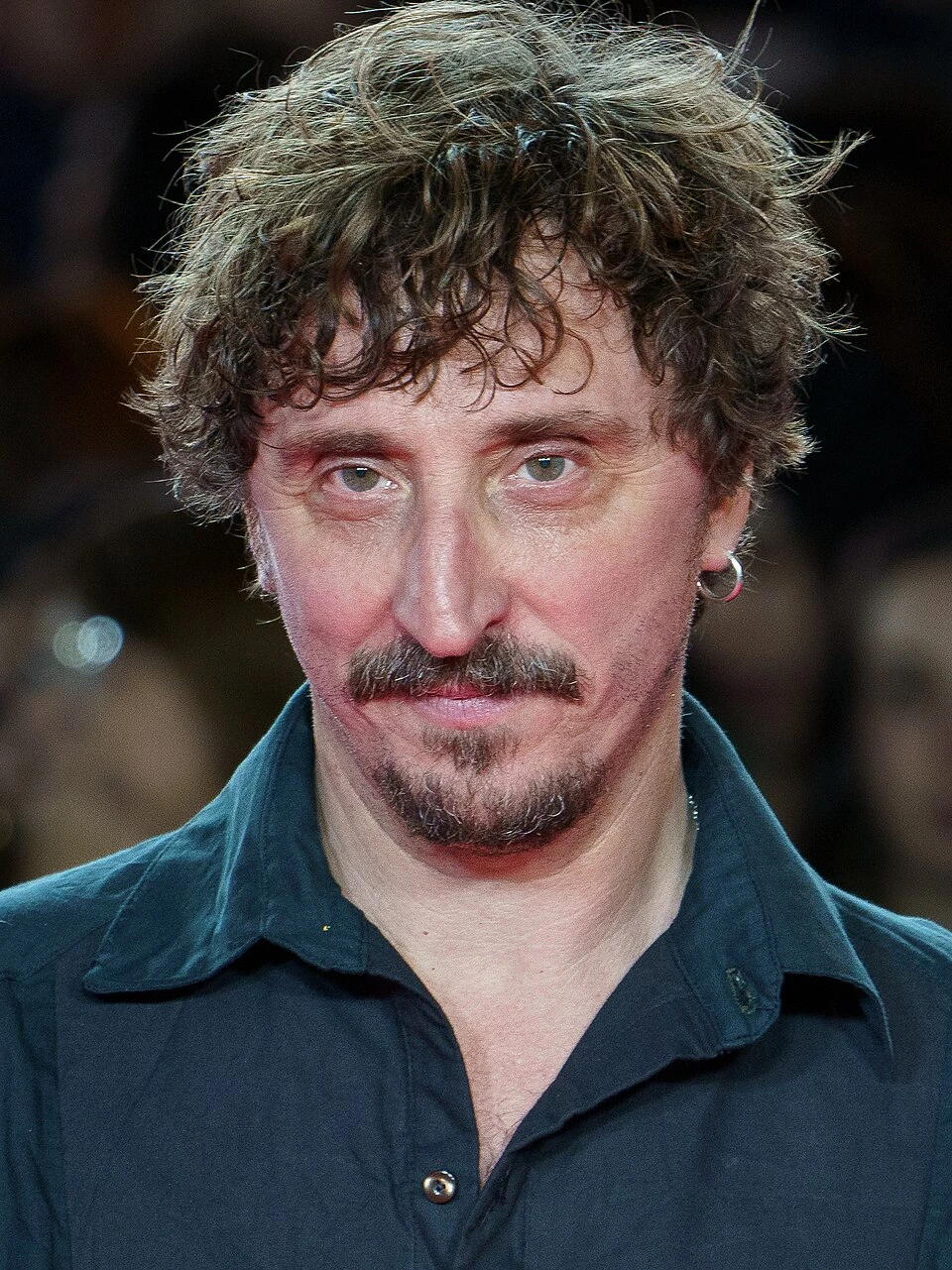 Close-up portrait of Iván Massagué Horta at a film event