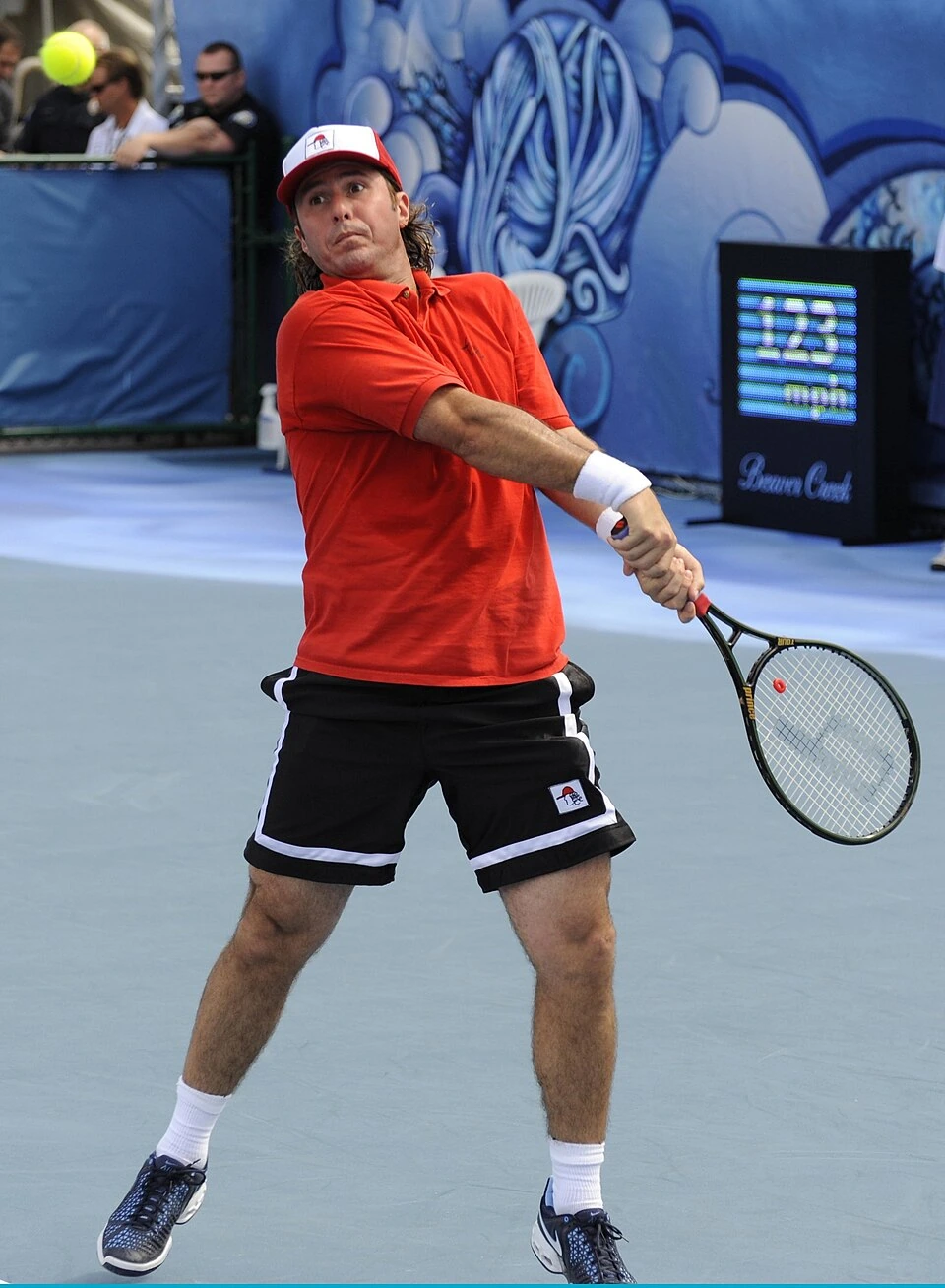 Vince Spadea playing tennis on court